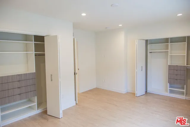 an empty room with shelves
