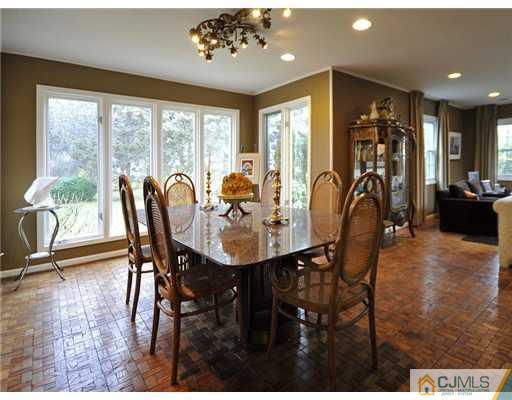 7 Edgewood Road Old Bridge, NJ 07747 - Photo 4 of 16 a view of a dining room with furniture window and outside view