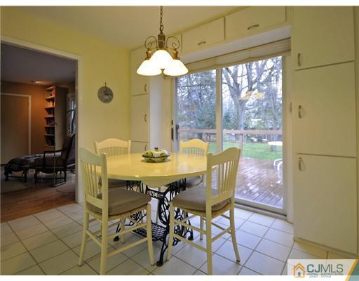 7 Edgewood Road Old Bridge, NJ 07747 - Photo 6 of 16 a view of a dining room with furniture window and outside view