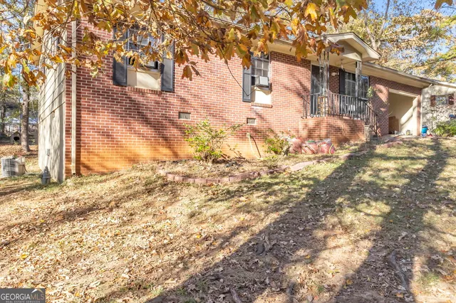 a view of a yard covered with snow