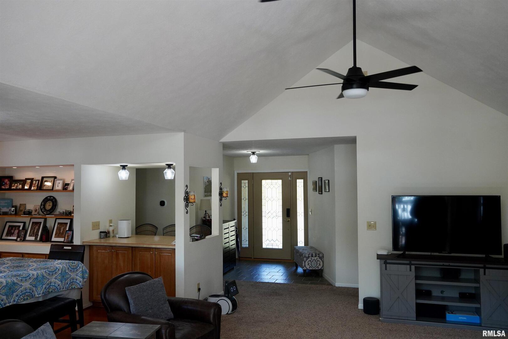 15316 Lake Point Drive Benton, IL 62812 - Photo 18 of 58 a view of a livingroom with furniture and a flat screen tv