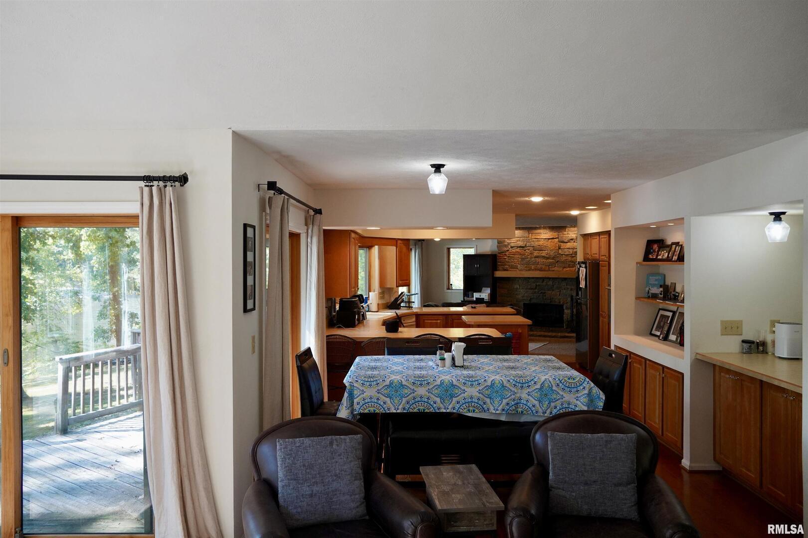 15316 Lake Point Drive Benton, IL 62812 - Photo 19 of 58 a dining room with furniture and a window
