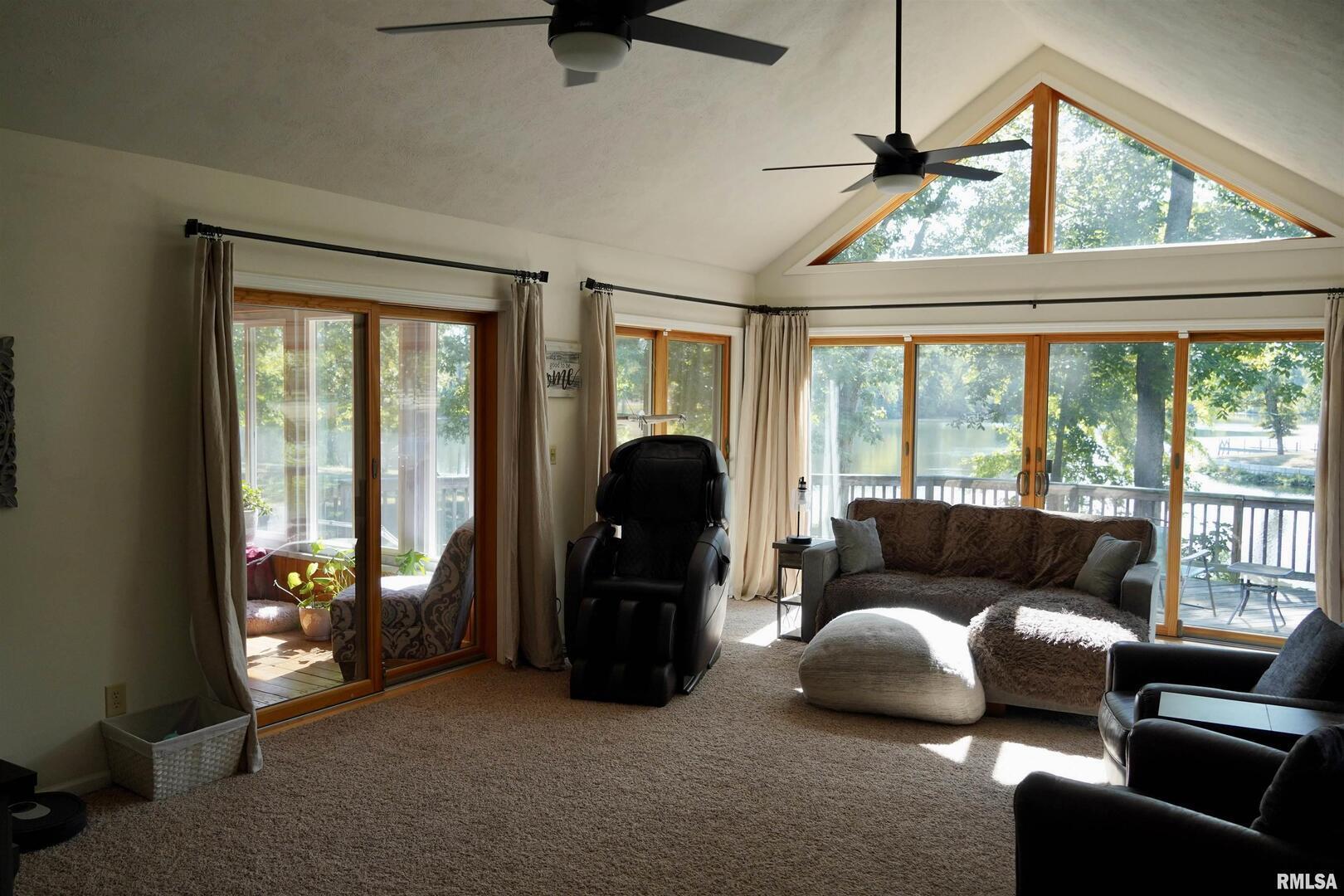 15316 Lake Point Drive Benton, IL 62812 - Photo 24 of 58 a living room with furniture and a large window