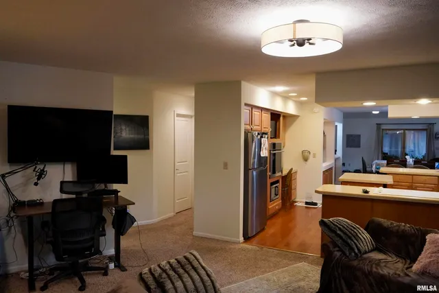 a view of a hallway view with staircase