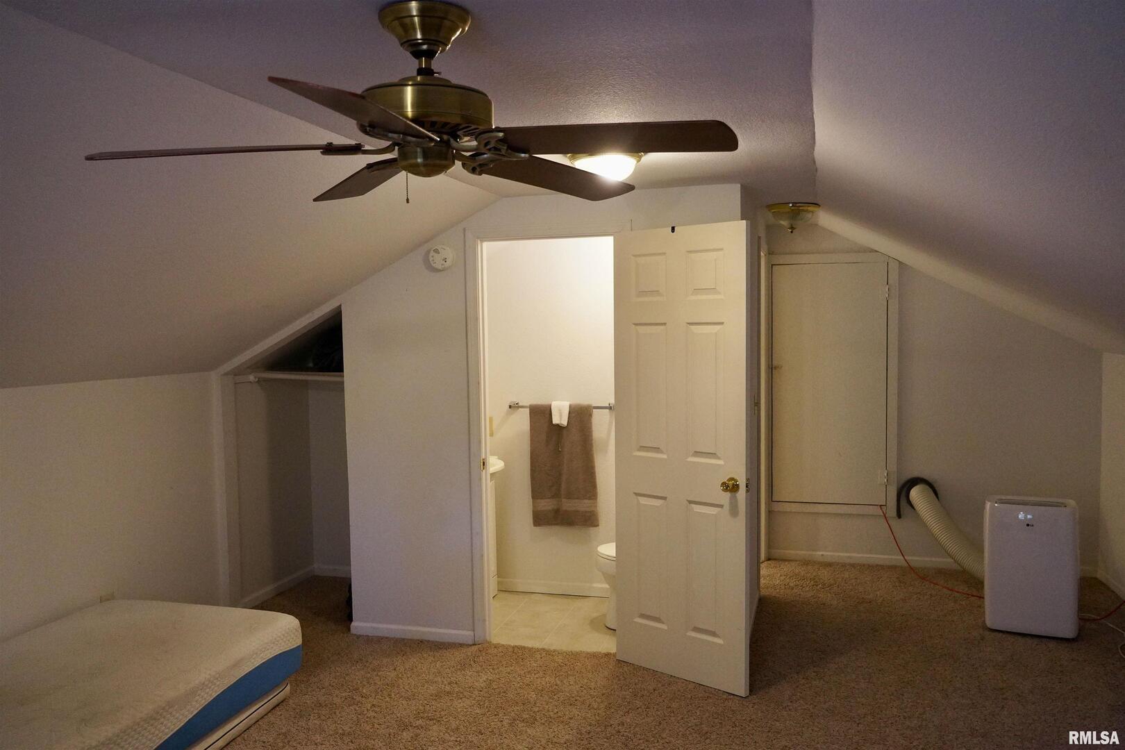 15316 Lake Point Drive Benton, IL 62812 - Photo 31 of 58 a view of a room with a ceiling fan