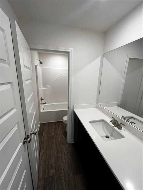 117 Lavender Circle Calhoun, GA 30701 - Photo 9 of 22 a bathroom with a sink a toilet and a mirror