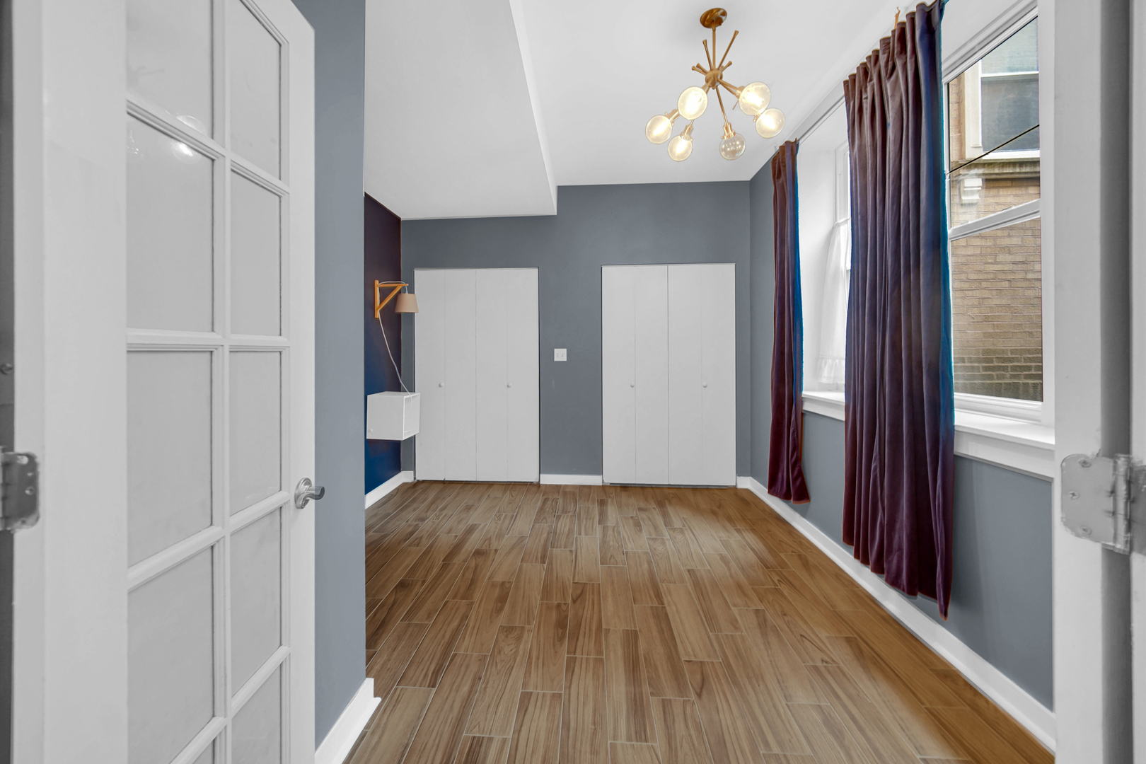 4343 North Sacramento Avenue, Unit AG Chicago, IL 60618 - Photo 20 of 27 a view of hallway with wooden floor and staircase