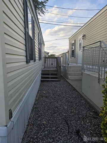 a view of a back yard of the house