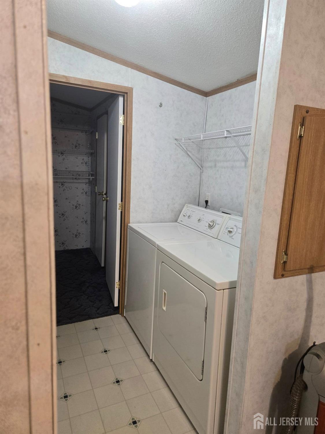 8 3rd Street Avenel, NJ 07001 - Photo 8 of 10 a utility room with a sink a washer and dryer