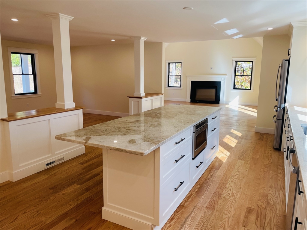4 Resolution Road Truro, MA 02666 - Photo 12 of 39 a spacious bathroom with a granite countertop sink a mirror and shower