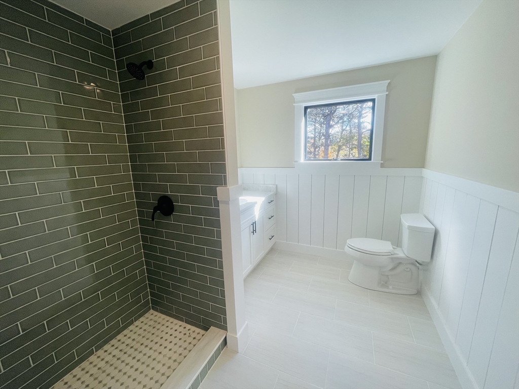 4 Resolution Road Truro, MA 02666 - Photo 17 of 39 a bathroom with a toilet and a shower