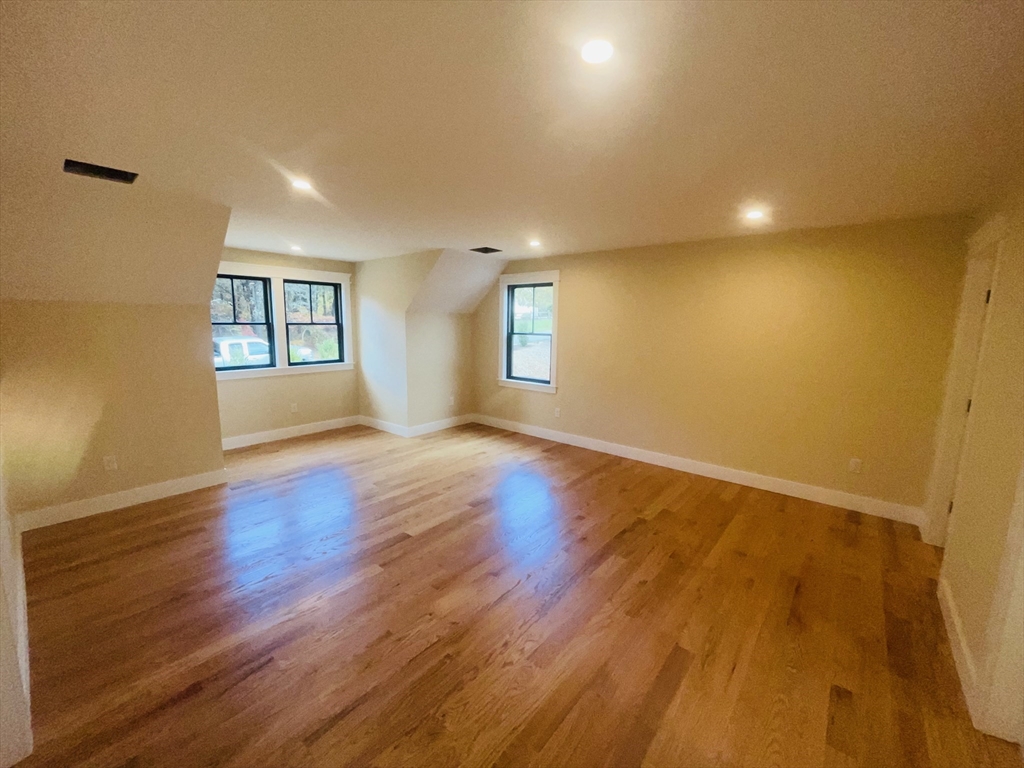 4 Resolution Road Truro, MA 02666 - Photo 30 of 39 a view of an empty room with wooden floor and a window