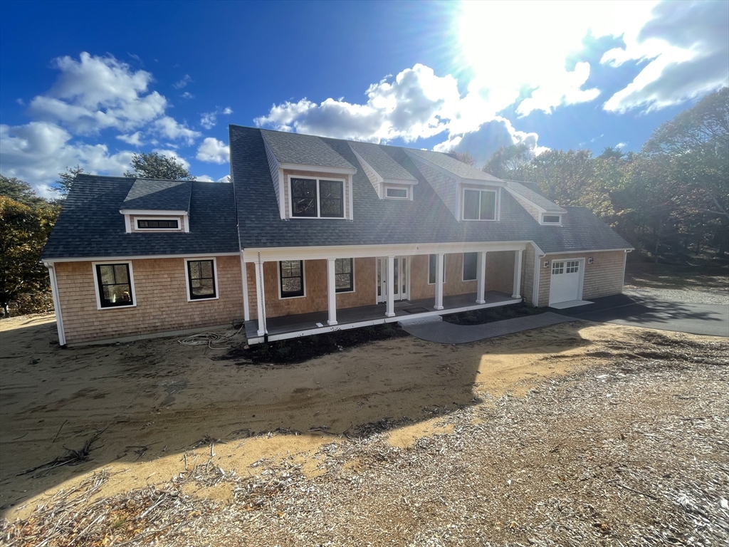 4 Resolution Road Truro, MA 02666 - Photo 3 of 39 a view of a house with a yard