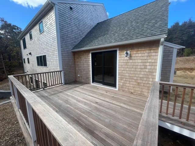 a view of backyard with deck