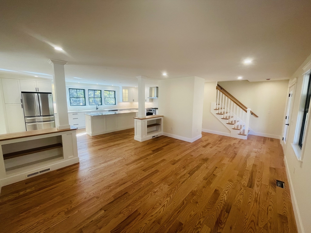 4 Resolution Road Truro, MA 02666 - Photo 6 of 39 a spacious bedroom with a bed and a large window