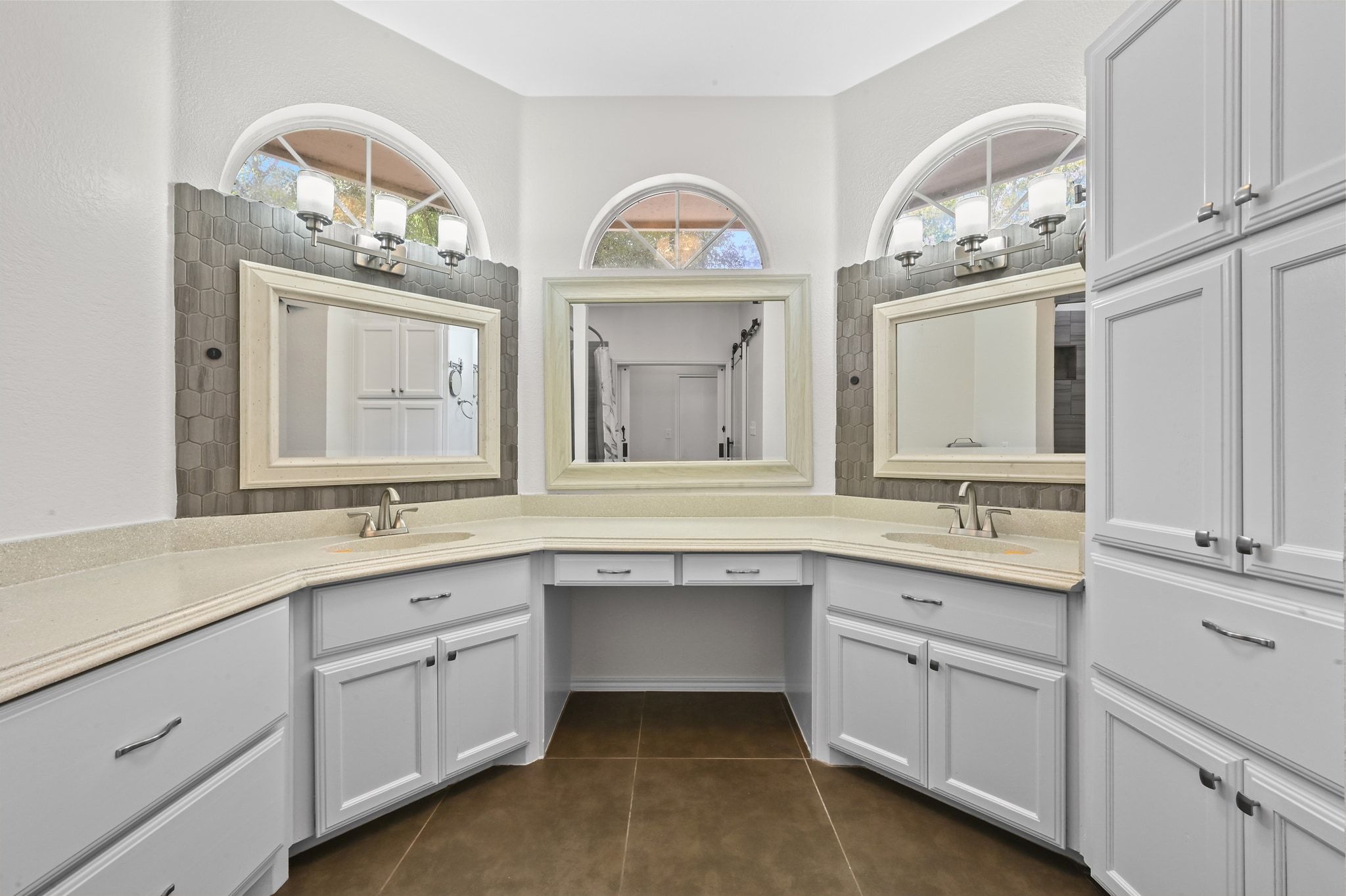201 Comanche Camp Kyle, TX 78640 - Photo 15 of 37 a bathroom with a double vanity sink a mirror a and a window
