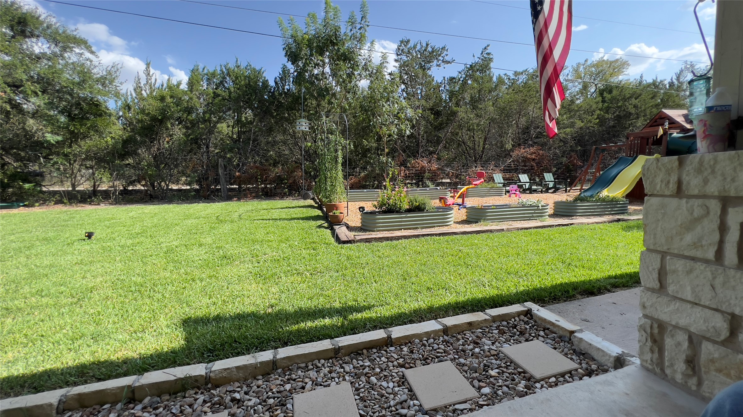 201 Comanche Camp Kyle, TX 78640 - Photo 3 of 37 a view of a backyard with sitting area