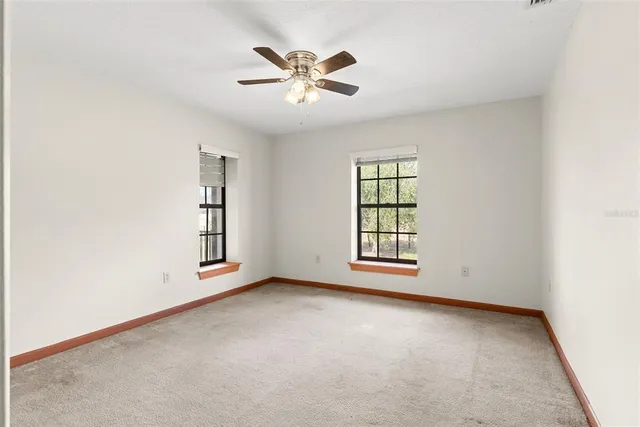a view of a swimming pool with an ocean view