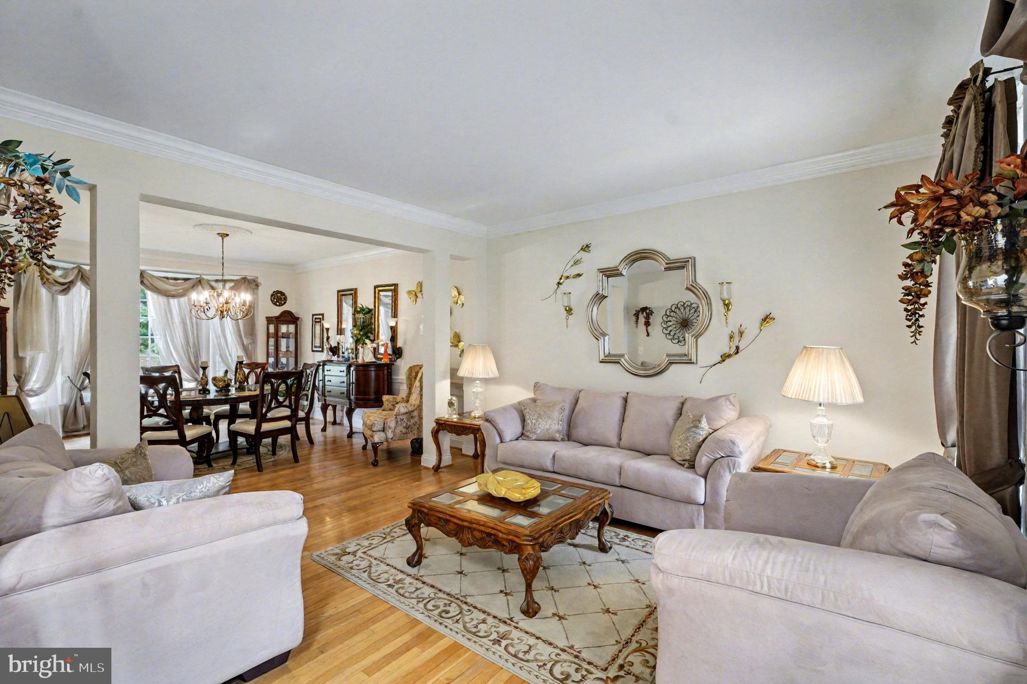 3320 McCorkle Court Triangle, VA 22172 - Photo 12 of 32 a living room with furniture and a large mirror