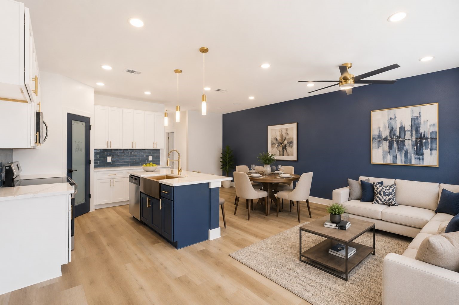 4606 Mallow Street, Unit B Houston, TX 77051 - Photo 6 of 25 a living room with stainless steel appliances kitchen island granite countertop a couch and a view of kitchen appliances