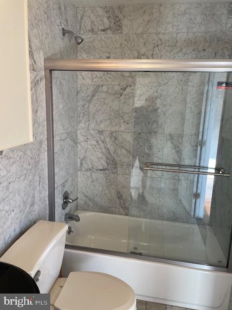 2154 Ridge Avenue, Unit 3 Philadelphia, PA 19121 - Photo 17 of 27 a bathroom with a toilet and a bathtub