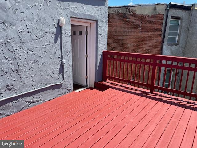 2154 Ridge Avenue, Unit 3 Philadelphia, PA 19121 - Photo 25 of 27 a view of backyard with wooden floor and fence