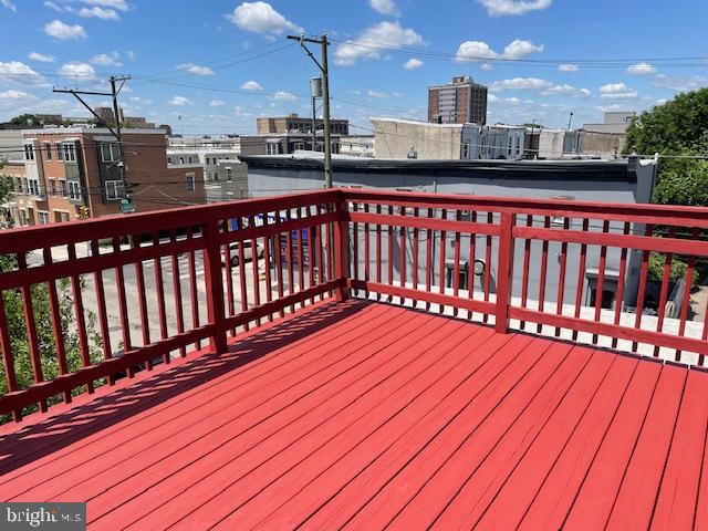 2154 Ridge Avenue, Unit 3 Philadelphia, PA 19121 - Photo 26 of 27 a view of a balcony with wooden floor