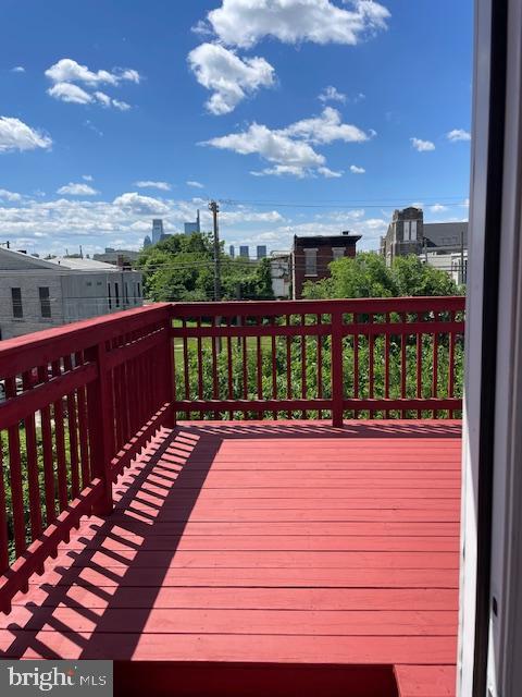 2154 Ridge Avenue, Unit 3 Philadelphia, PA 19121 - Photo 7 of 27 a view of a balcony with wooden floor