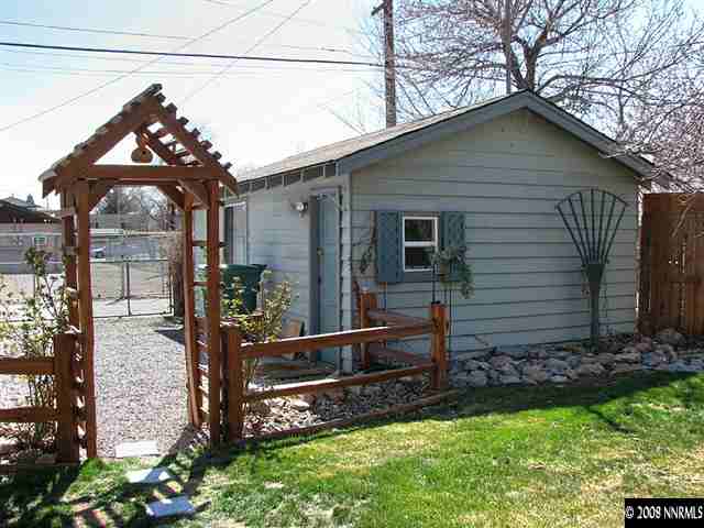 430 East Taylor Street Reno, NV 89502 - Photo 7 of 9 a view of a house with a yard and wooden fence
