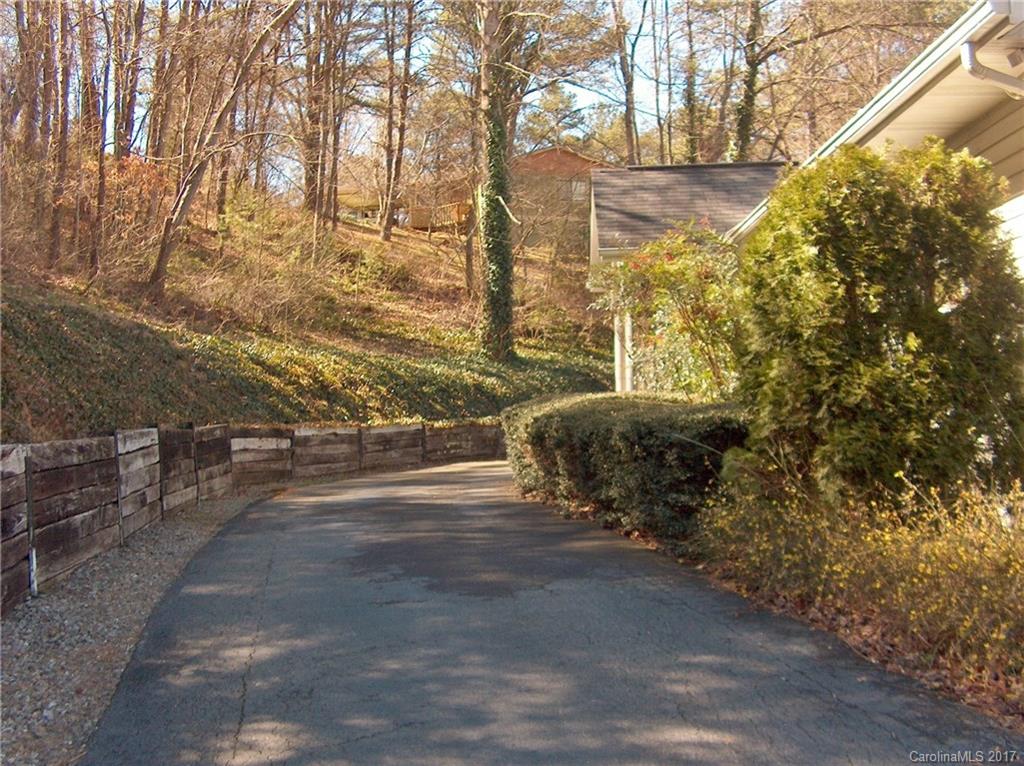48 Falling Spring Road Clyde, NC 28721 - Photo 4 of 24 a view of a yard with an outdoor space