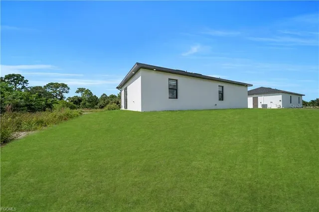 a house view with garden space