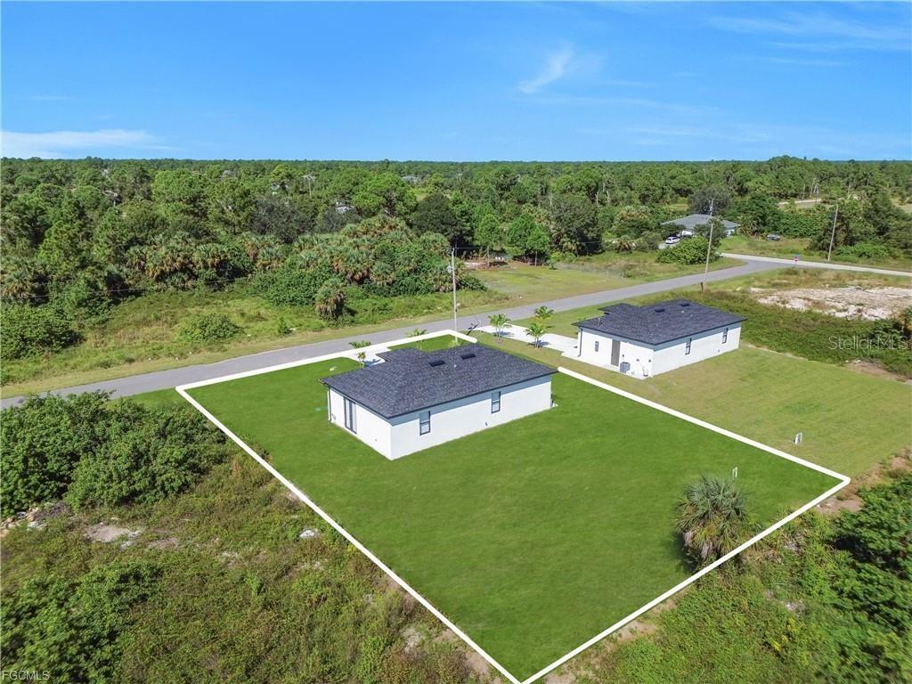 713 Roma Avenue South Lehigh Acres, FL 33974 - Photo 31 of 38 a view of a tennis court