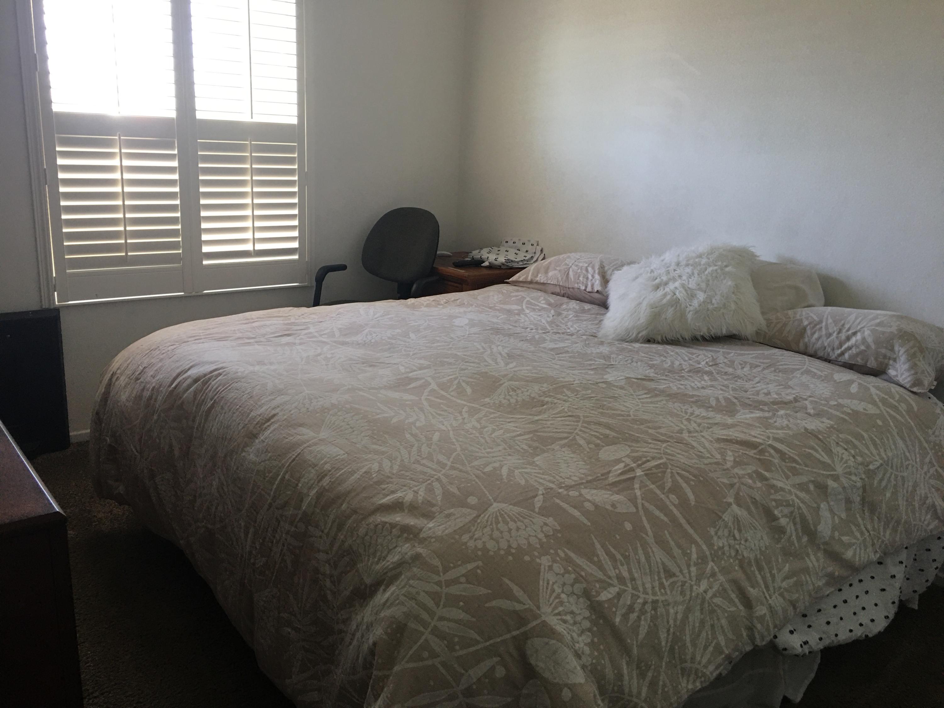 67874 Rio Largo Road Cathedral City, CA 92234 - Photo 11 of 20 a bedroom with a bed and window