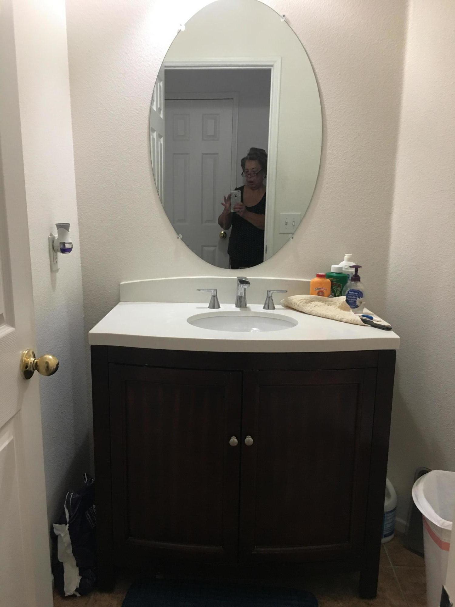 67874 Rio Largo Road Cathedral City, CA 92234 - Photo 13 of 20 a bathroom with a sink and a mirror