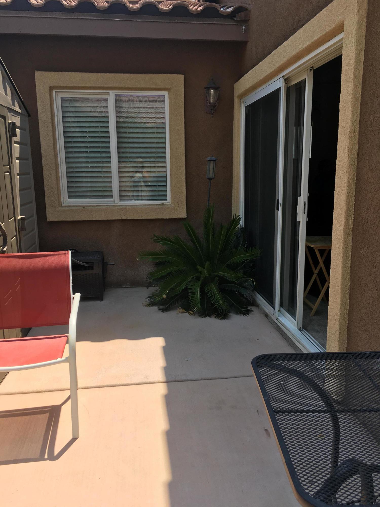 67874 Rio Largo Road Cathedral City, CA 92234 - Photo 19 of 20 a potted plant sitting in front of a house