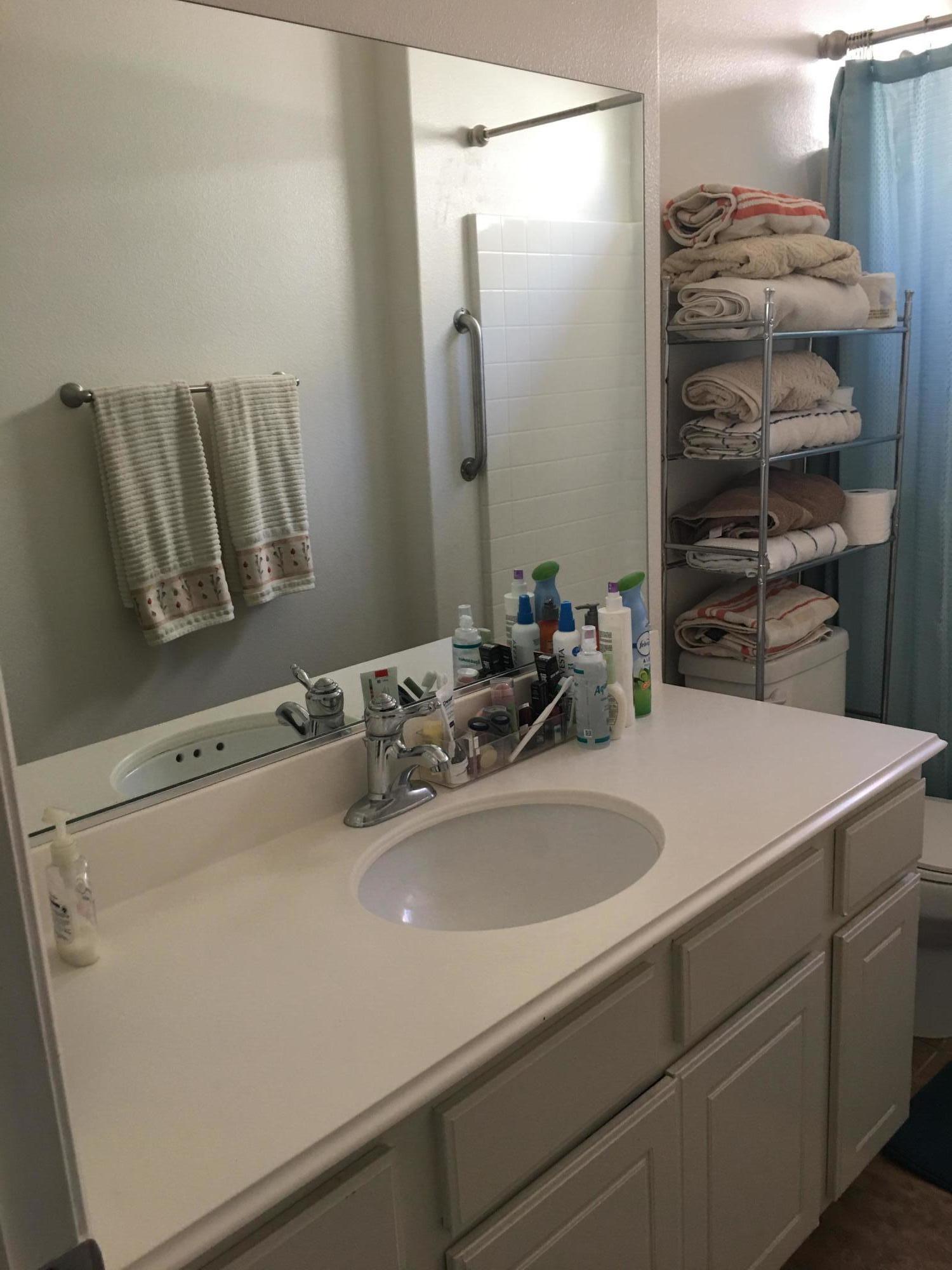 67874 Rio Largo Road Cathedral City, CA 92234 - Photo 10 of 20 a bathroom with a sink and a mirror