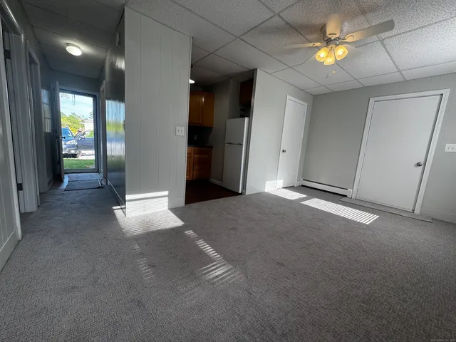 a view of empty room with fan