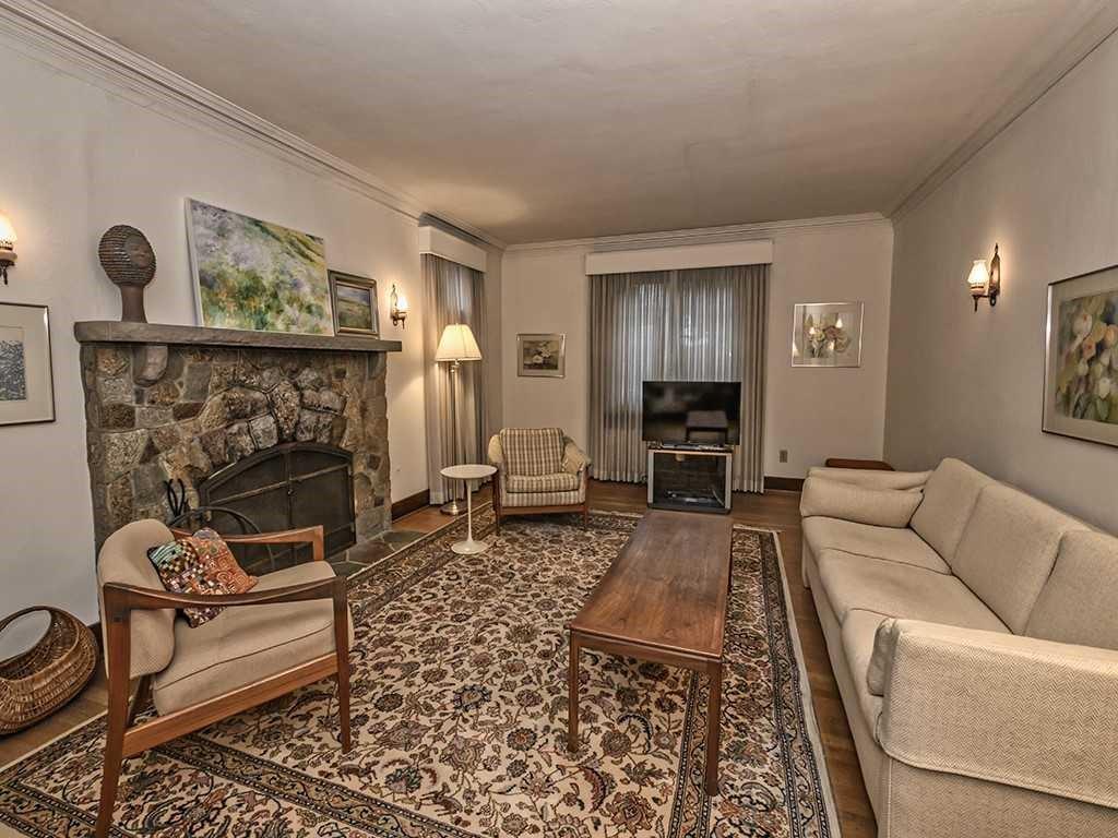 627 Beverly Road Mt. Lebanon, PA 15243 - Photo 3 of 21 The Living Room Boasts Hardwood, Crown Molding, Fireplace, and Built in Book Shelves.