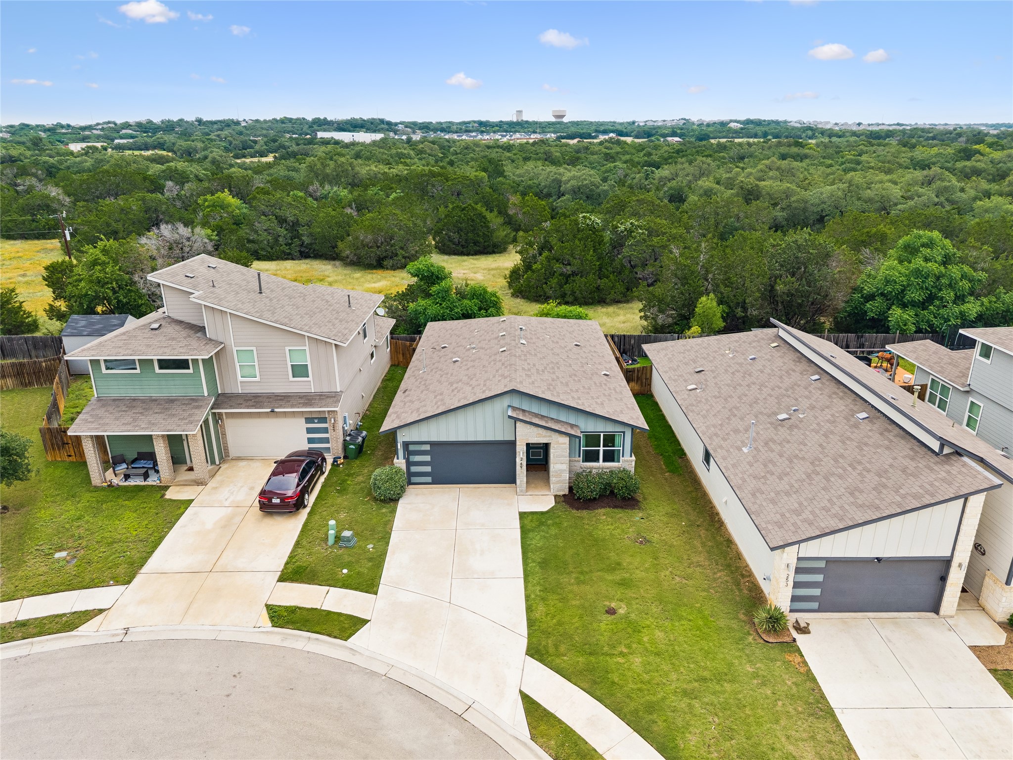 249 Century Plant Road Leander, TX 78641 - Photo 18 of 22 an aerial view of multiple houses with a yard