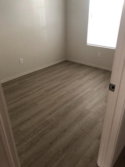1724 27th Street Lubbock, TX 79411 - Photo 5 of 7 an empty room with a window