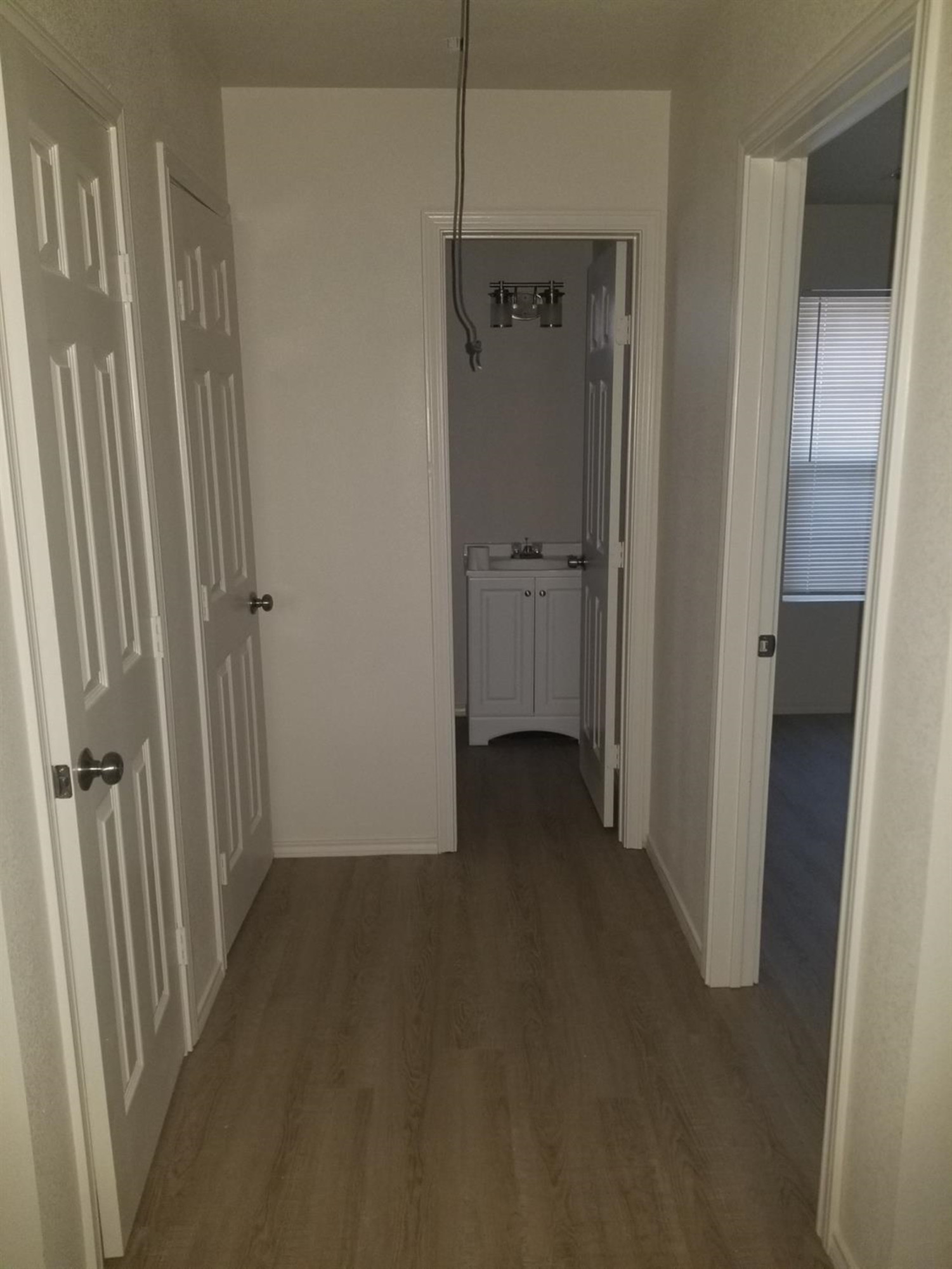 1724 27th Street Lubbock, TX 79411 - Photo 6 of 7 a view of a hallway with a room