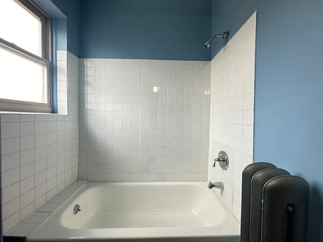 a bathroom with a bathtub