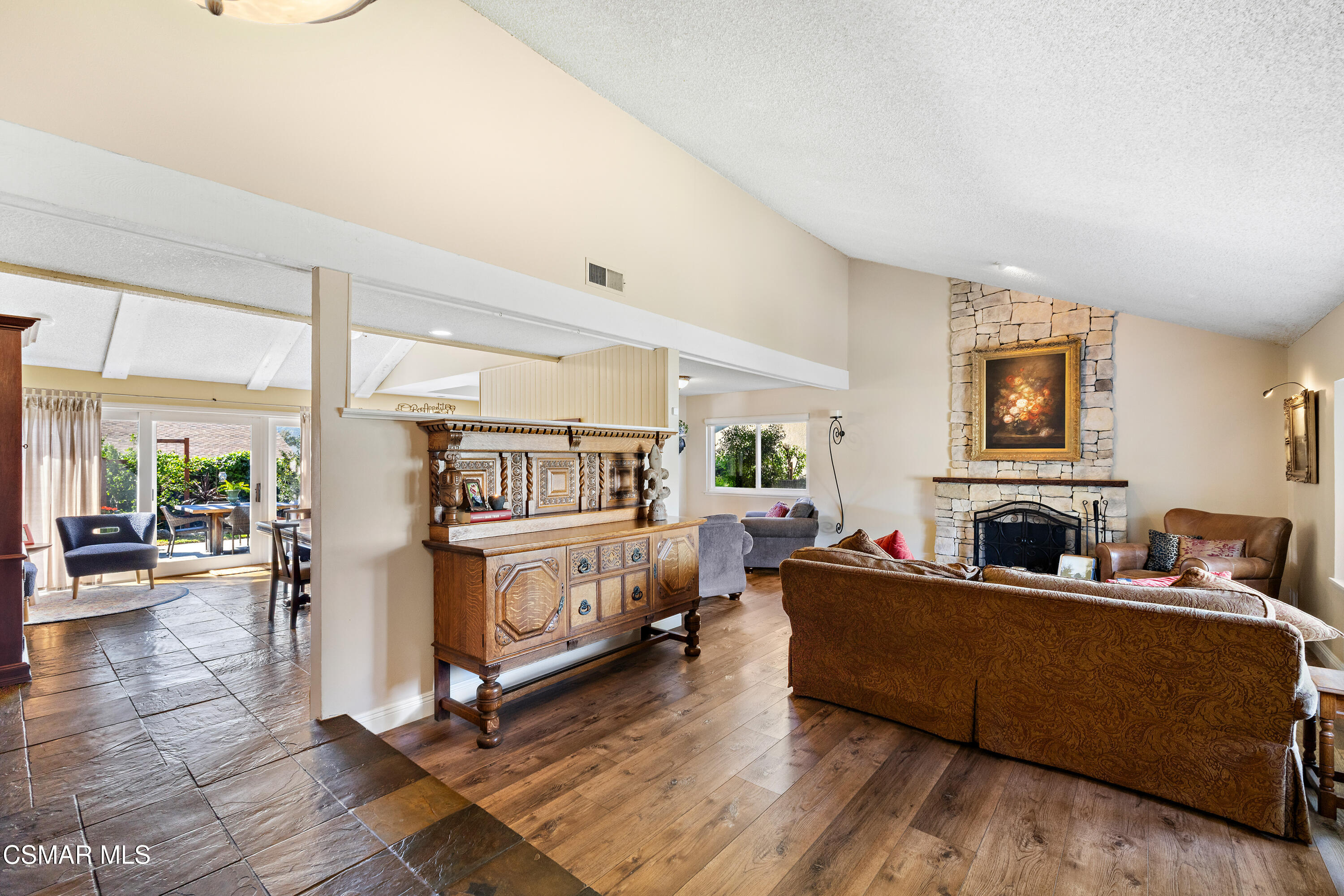 5914 Cochran Street Simi Valley, CA 93063 - Photo 5 of 23 a living room with furniture and large windows