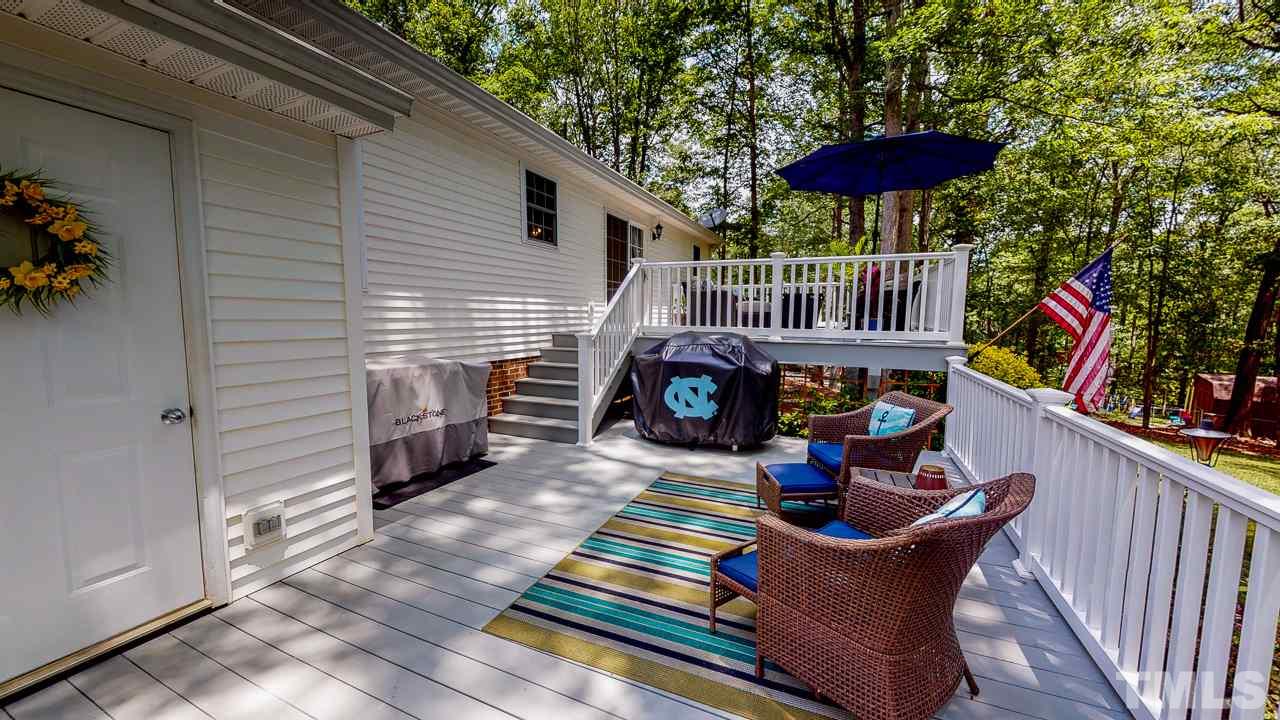 3612 Moriah Road Rougemont, NC 27572 - Photo 14 of 29 a view of a chairs and tables in the balcony