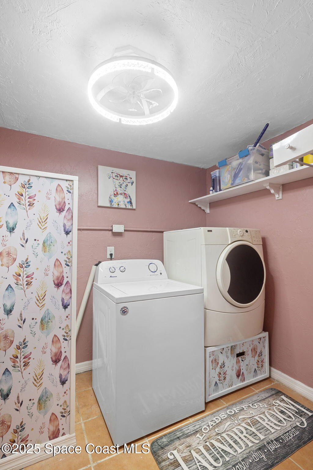 4535 Moon Road Titusville, FL 32780 - Photo 20 of 37 a utility room with dryer and washer