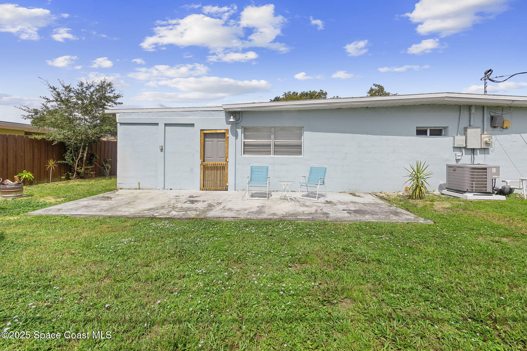4535 Moon Road Titusville, FL 32780 - Photo 31 of 37 a view of a house with a yard