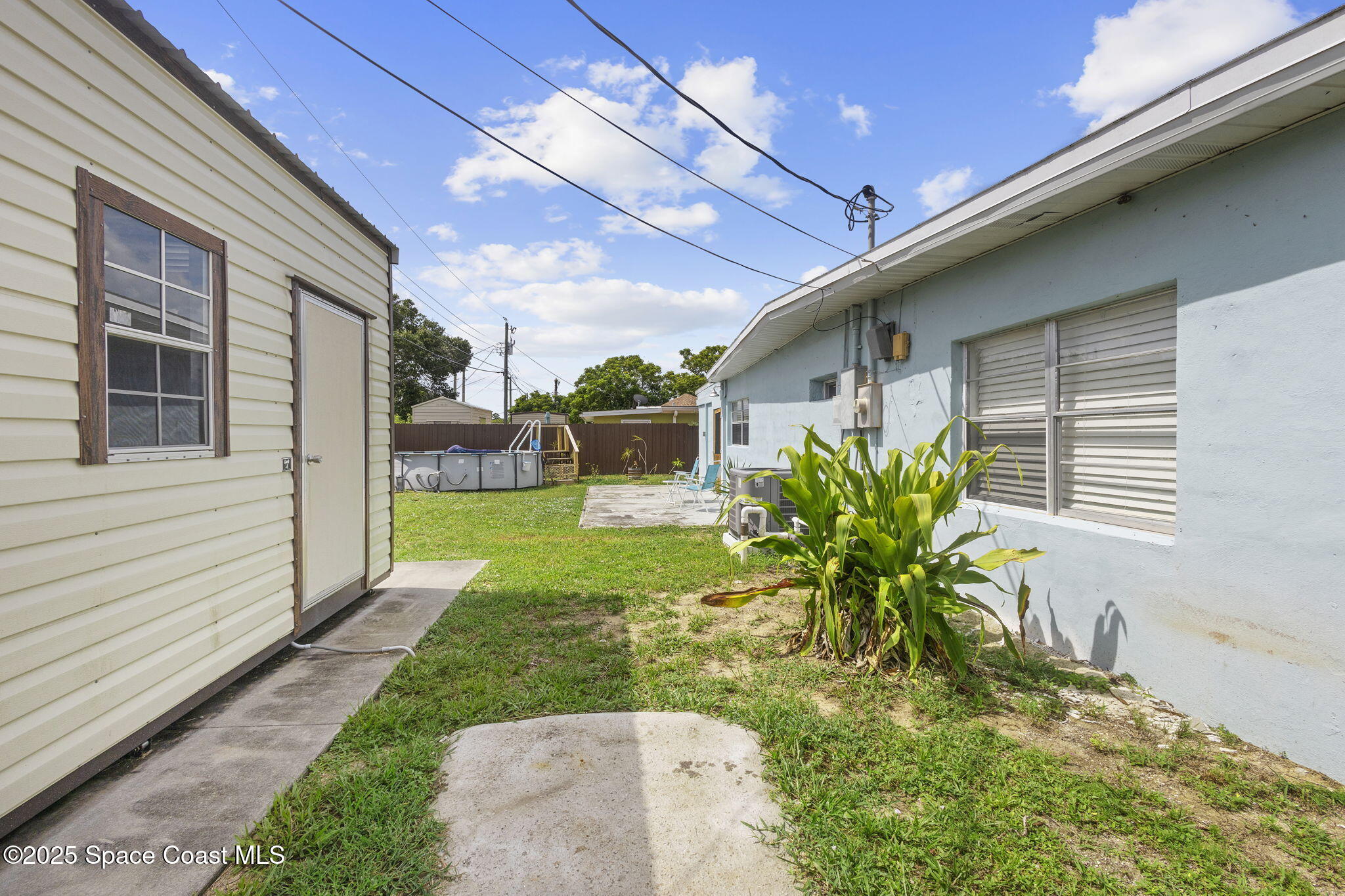 4535 Moon Road Titusville, FL 32780 - Photo 32 of 37 a view of a house with a yard