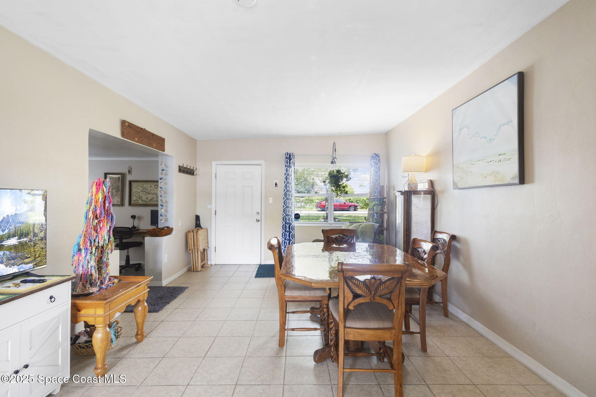 4535 Moon Road Titusville, FL 32780 - Photo 6 of 37 a dining room with furniture and window