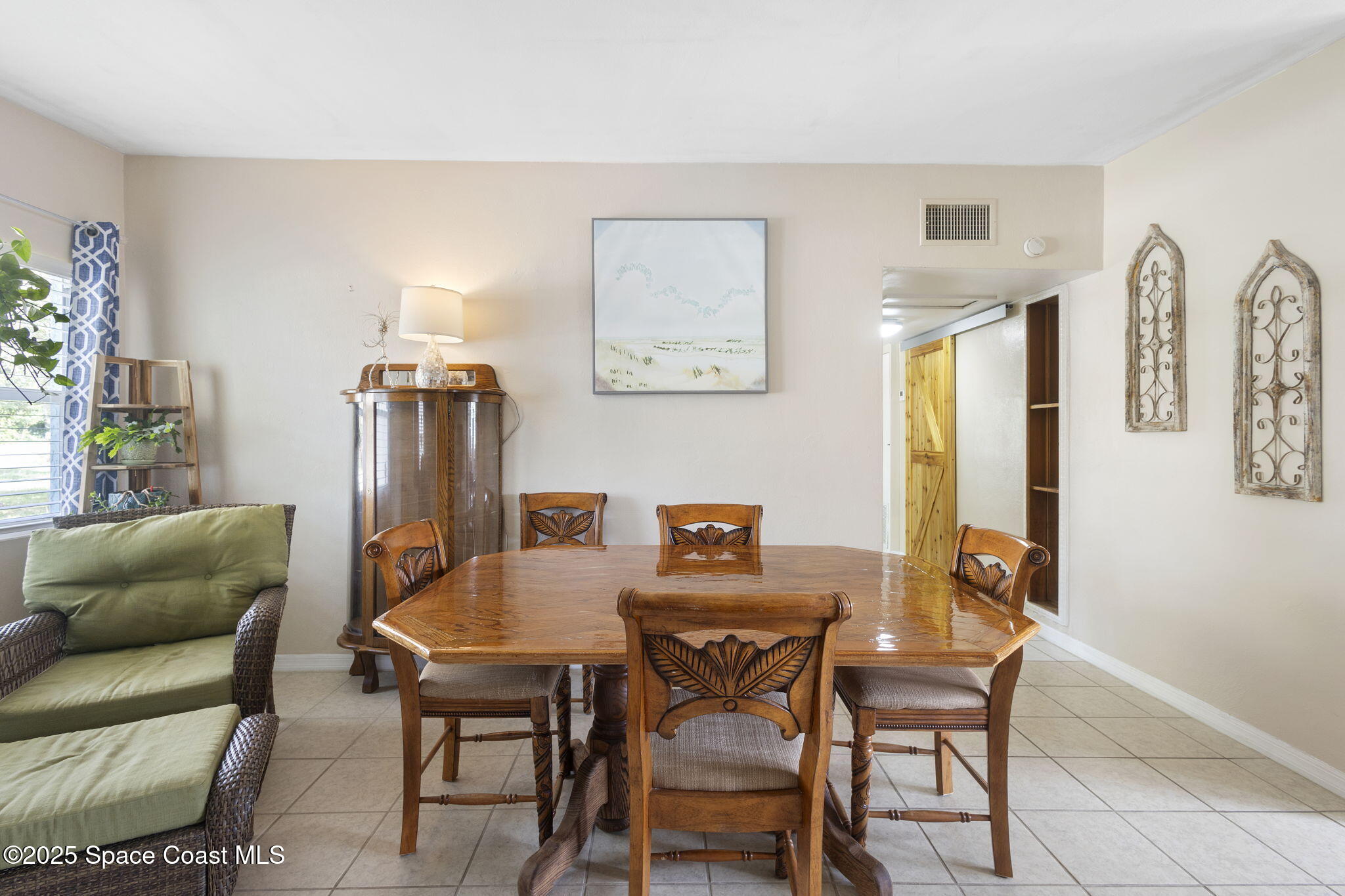4535 Moon Road Titusville, FL 32780 - Photo 9 of 37 a view of a dining room with furniture
