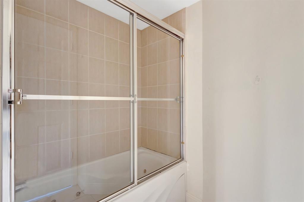 610 Clematis Street, Unit 412 West Palm Beach, FL 33401 - Photo 19 of 52 a bathroom with a shower